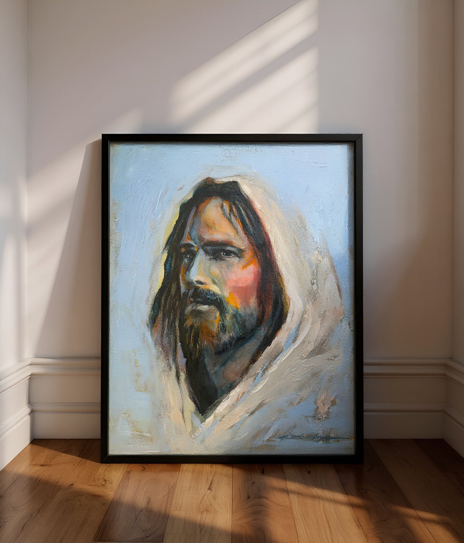 A modern Painting of Jesus with big brushstrokes and a lot of texture framed with a black frame.
