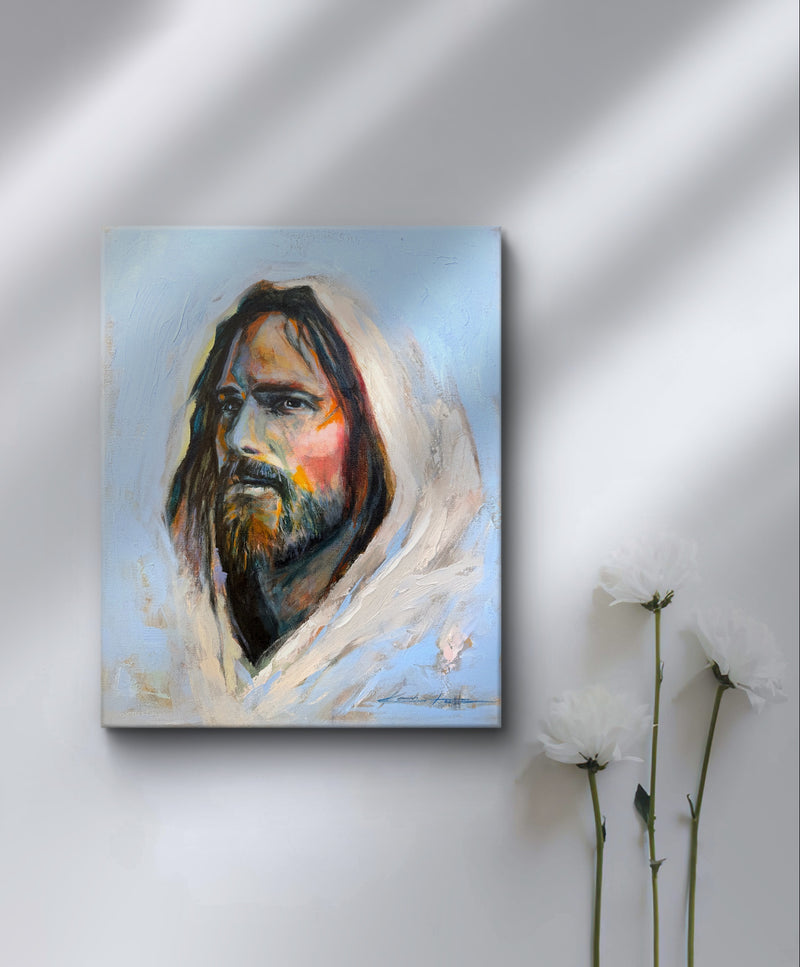Painting of Jesus on Canvas with a vibrant blue background with white flowers in the foreground.
